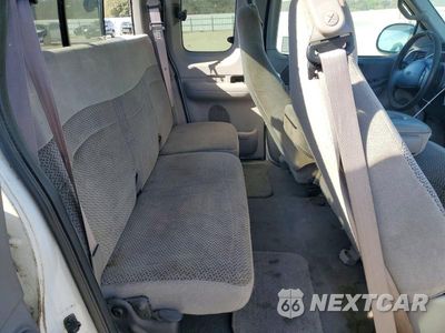Zdjęcie 10 z 12 samochodu: 2000 FORD F150 VIN:1FTRX17L1YKA73385 - miniatura