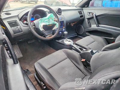 Zdjęcie 8 z 12 samochodu: 2007 HYUNDAI TIBURON GS VIN:KMHHM66D87U240559 - miniatura