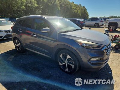 Czwarte zdjęcie samochodu z boku: 2017 HYUNDAI TUCSON LIMITED VIN:KM8J33A25HU324039 - miniatura