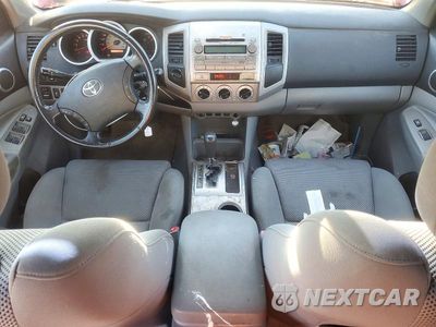 Zdjęcie 8 z 12 samochodu: 2009 TOYOTA TACOMA V6 VIN:3TMLU42N29M036252 - miniatura
