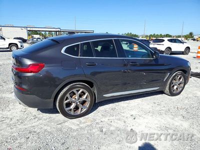 Trzecie zdjęcie samochodu z tyłu: 2021 BMW X4 XDRIVE30I VIN:5UX2V1C09M9G72346 - miniatura