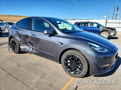 Czwarte zdjęcie samochodu z boku: 2020 TESLA MODEL Y VIN:5YJYGDEE3LF052044 - miniatura