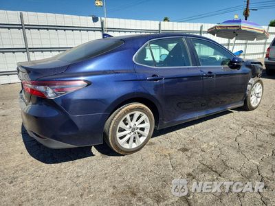 Trzecie zdjęcie samochodu z tyłu: 2022 TOYOTA CAMRY LE VIN:4T1C11AKXNU663622 - miniatura