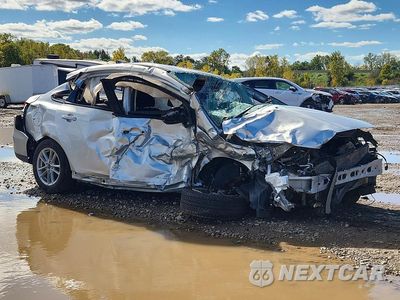 Czwarte zdjęcie samochodu z boku: 2017 FORD FOCUS SE VIN:1FADP3F24HL315584 - miniatura