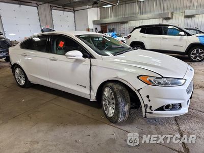 Czwarte zdjęcie samochodu z boku: 2016 FORD FUSION SE HYBRID VIN:3FA6P0LU6GR172554 - miniatura