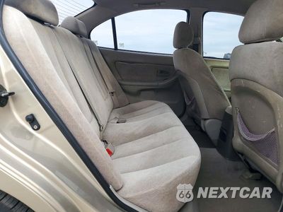 Zdjęcie 10 z 12 samochodu: 2005 HYUNDAI ELANTRA VIN:KMHDN46DX5U053319 - miniatura