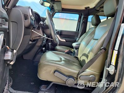 Zdjęcie 7 z 12 samochodu: 2016 JEEP WRANGLER UNLIMITED SAHARA VIN:1C4BJWEGXGL114479 - miniatura