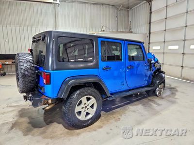 Trzecie zdjęcie samochodu z tyłu: 2015 JEEP WRANGLER UNLIMITED SPORT VIN:1C4HJWDG8FL707798 - miniatura