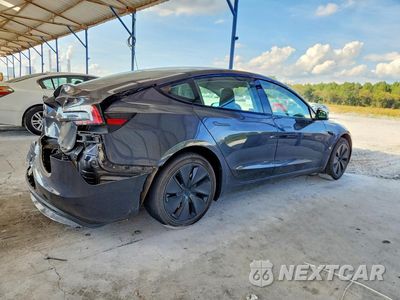 Trzecie zdjęcie samochodu z tyłu: 2024 TESLA MODEL 3 VIN:5YJ3E1EA0RF739437 - miniatura