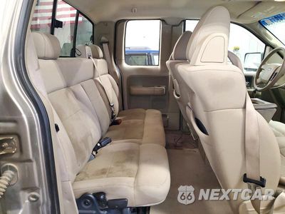 Zdjęcie 10 z 12 samochodu: 2004 FORD F150 VIN:1FTVX14574NB64674 - miniatura