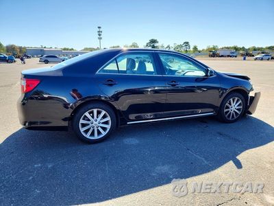 Trzecie zdjęcie samochodu z tyłu: 2014 TOYOTA CAMRY XLE VIN:4T1BF1FK3EU835981 - miniatura