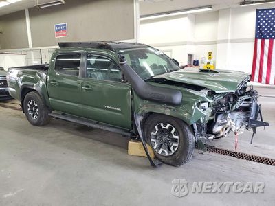 Czwarte zdjęcie samochodu z boku: 2021 TOYOTA TACOMA TRD OFF-ROAD VIN:3TYCZ5AN6MT019041 - miniatura