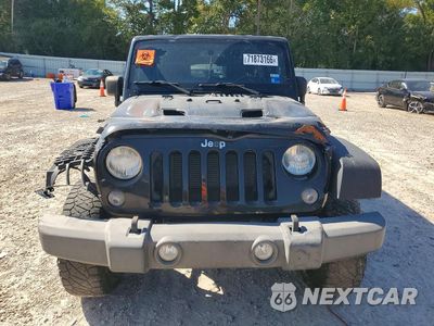 Piąte zdjęcie samochodu w środku: 2014 JEEP WRANGLER UNLIMITED RUBICON VIN:1C4HJWFG1EL220681 - miniatura