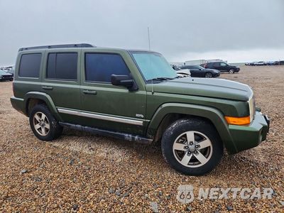 Czwarte zdjęcie samochodu z boku: 2006 JEEP COMMANDER VIN:1J8HG48K86C356773 - miniatura
