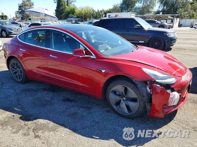 Czwarte zdjęcie samochodu z boku: 2019 TESLA MODEL 3 VIN:5YJ3E1EA6KF308638 - miniatura