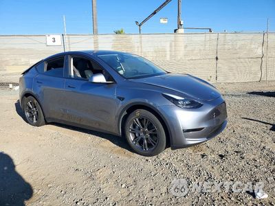 Czwarte zdjęcie samochodu z boku: 2024 TESLA MODEL Y VIN:7SAYGAEE3RF209680 - miniatura