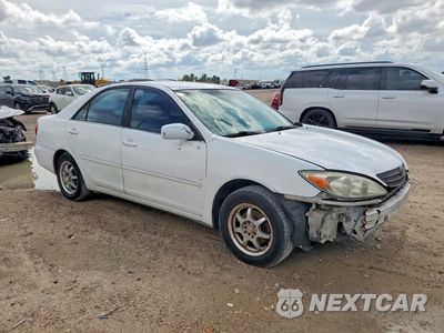 Czwarte zdjęcie samochodu z boku: 2004 TOYOTA CAMRY LE VIN:JTDBE32K540262774 - miniatura