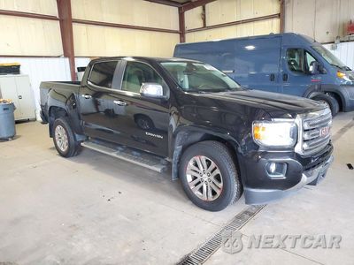 Czwarte zdjęcie samochodu z boku: 2016 GMC CANYON SLT VIN:1GTG5DE33G1315051 - miniatura