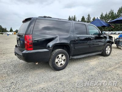 Trzecie zdjęcie samochodu z tyłu: 2013 CHEVROLET SUBURBAN K1500 LT VIN:1GNSKJE72DR305958 - miniatura