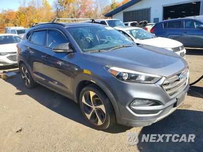 Czwarte zdjęcie samochodu z boku: 2016 HYUNDAI TUCSON LIMITED VIN:KM8J3CA20GU108999 - miniatura