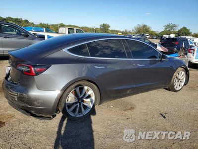 Trzecie zdjęcie samochodu z tyłu: 2018 TESLA MODEL 3 VIN:5YJ3E1EA9JF059539 - miniatura