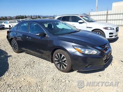 Czwarte zdjęcie samochodu z boku: 2018 NISSAN ALTIMA 2.5 SV VIN:1N4AL3AP7JC141159 - miniatura