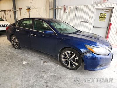 Czwarte zdjęcie samochodu z boku: 2017 NISSAN ALTIMA 2.5 SR VIN:1N4AL3AP3HC157109 - miniatura