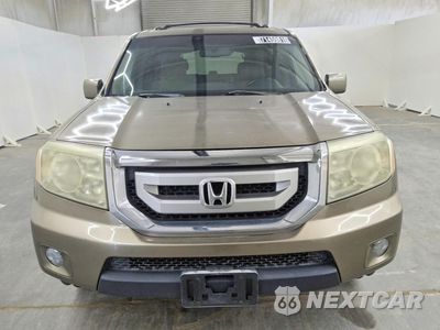 Piąte zdjęcie samochodu w środku: 2011 HONDA PILOT EXL VIN:5FNYF3H66BB043273 - miniatura