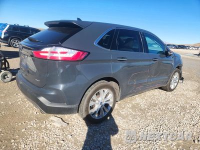 Trzecie zdjęcie samochodu z tyłu: 2021 FORD EDGE TITANIUM VIN:2FMPK4K94MBA21154 - miniatura