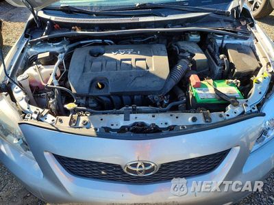 Zdjęcie 11 z 12 samochodu: 2009 TOYOTA COROLLA LE VIN:JTDBL40EX9J016765 - miniatura