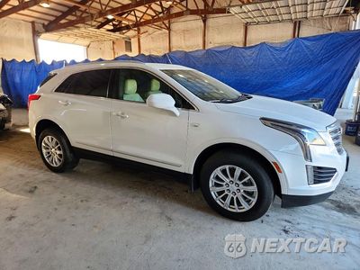 Czwarte zdjęcie samochodu z boku: 2017 CADILLAC XT5 VIN:1GYKNARS1HZ174679 - miniatura