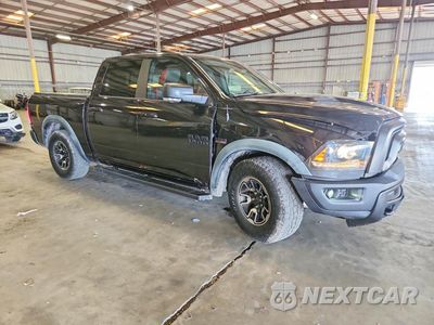 Czwarte zdjęcie samochodu z boku: 2016 RAM 1500 REBEL VIN:1C6RR6YT3GS100811 - miniatura