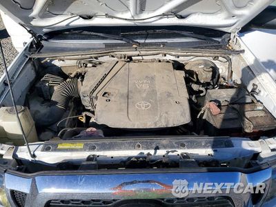 Zdjęcie 11 z 12 samochodu: 2011 TOYOTA TACOMA V6 VIN:3TMLU4ENXBM068321 - miniatura