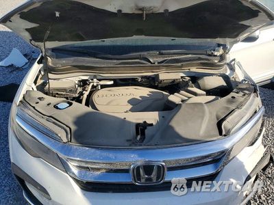 Zdjęcie 12 z 14 samochodu: 2021 HONDA PILOT ELITE VIN:5FNYF6H05MB044155 - miniatura