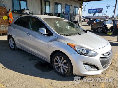 Czwarte zdjęcie samochodu z boku: 2013 HYUNDAI ELANTRA GT BASE VIN:KMHD35LE2DU094759 - miniatura