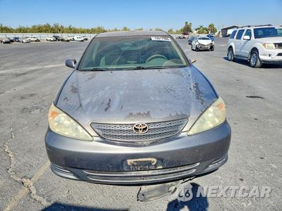 Piąte zdjęcie samochodu w środku: 2003 TOYOTA CAMRY LE V6 VIN:4T1BF32K33U555105 - miniatura