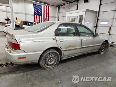 Trzecie zdjęcie samochodu z tyłu: 1996 HONDA ACCORD DX 4D SEDAN VIN:1HGCD5532TA149236 - miniatura