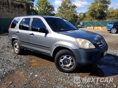 Czwarte zdjęcie samochodu z boku: 2006 HONDA CR-V LX VIN:JHLRD78586C029339 - miniatura