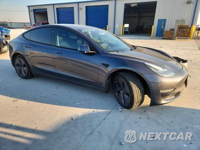 Czwarte zdjęcie samochodu z boku: 2019 TESLA MODEL 3 VIN:5YJ3E1EA2KF434737 - miniatura