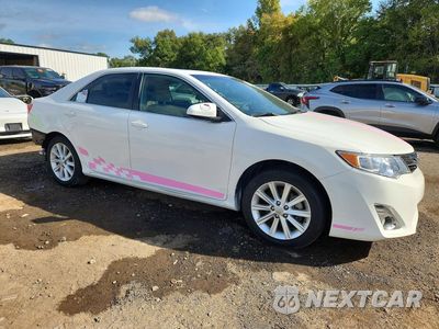 Czwarte zdjęcie samochodu z boku: 2012 TOYOTA CAMRY HYBRID XLE VIN:4T1BD1FK1CU012789 - miniatura