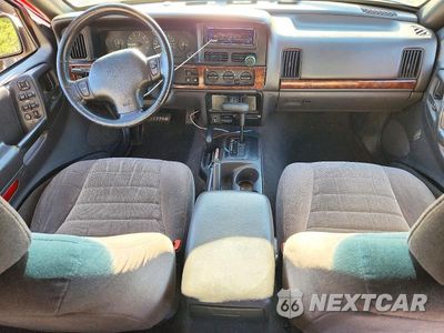 Zdjęcie 8 z 13 samochodu: 1997 JEEP GRAND CHEROKEE LAREDO VIN:1J4GZ58Y9VC531712 - miniatura