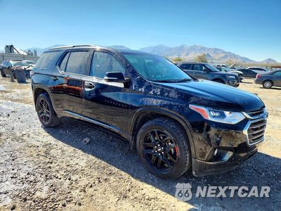 Czwarte zdjęcie samochodu z boku: 2020 CHEVROLET TRAVERSE PREMIER VIN:1GNEVKKWXLJ133682 - miniatura