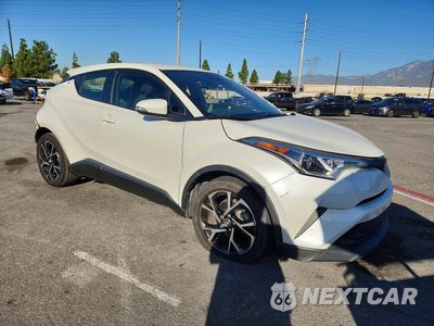 Czwarte zdjęcie samochodu z boku: 2019 TOYOTA C-HR XLE VIN:JTNKHMBX4K1053425 - miniatura
