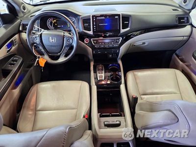 Zdjęcie 8 z 14 samochodu: 2018 HONDA PILOT TOURING VIN:5FNYF6H9XJB048311 - miniatura