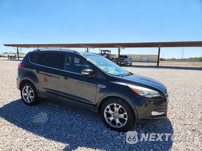 Czwarte zdjęcie samochodu z boku: 2014 FORD ESCAPE TITANIUM VIN:1FMCU0JX3EUC99606 - miniatura