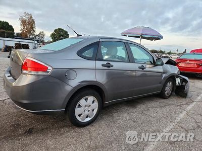 Trzecie zdjęcie samochodu z tyłu: 2010 FORD FOCUS S VIN:1FAHP3EN4AW292339 - miniatura