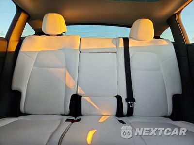 Zdjęcie 10 z 13 samochodu: 2023 TESLA MODEL Y VIN:7SAYGAEE4PF642485 - miniatura