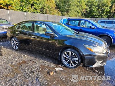 Czwarte zdjęcie samochodu z boku: 2016 NISSAN ALTIMA 2.5 SR VIN:1N4AL3AP6GC183699 - miniatura