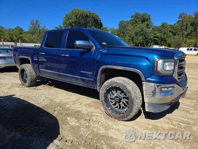 Czwarte zdjęcie samochodu z boku: 2018 GMC SIERRA K1500 SLT VIN:3GTU2NEC2JG284840 - miniatura