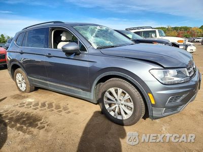 Czwarte zdjęcie samochodu z boku: 2018 VOLKSWAGEN TIGUAN SE VIN:3VV2B7AX0JM132456 - miniatura